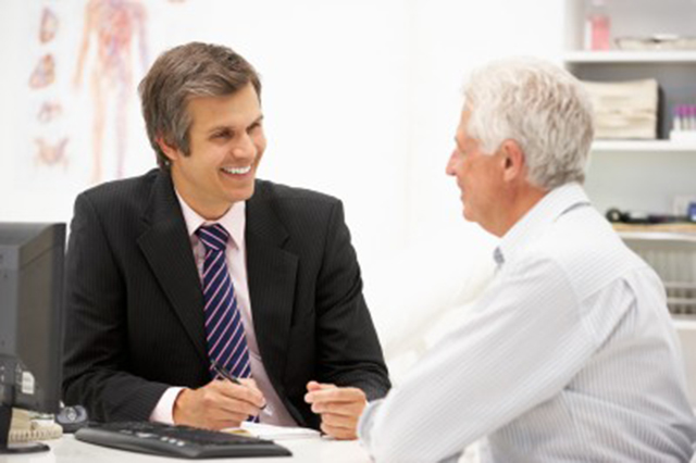 Image of doctor and an older patient talking