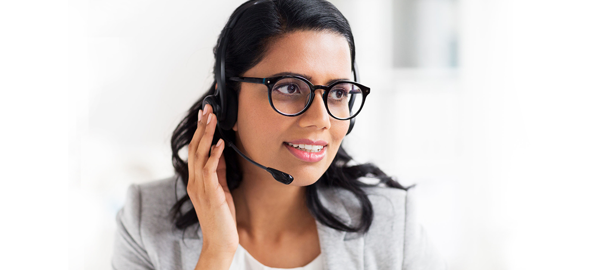 Slide Image of helpline team member talking on a headset